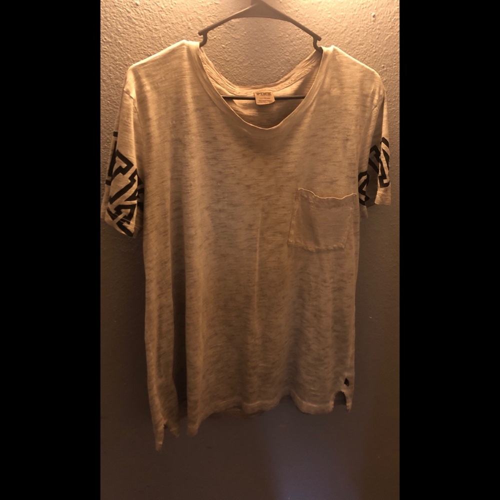 Victoria Secret’s (PINK) gray shirt